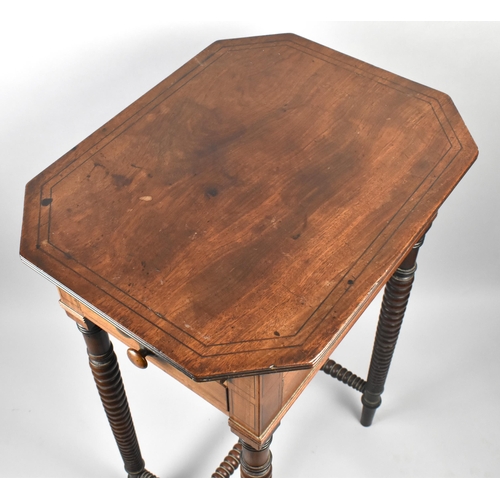 26 - A 19th Century Mahogany Table with Canted Stringed Top to Two Short Drawers Supported on Bobbin Supp... 