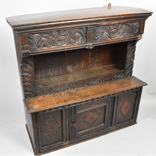 13 - An 18th Century Carved Oak Cabinet with Open Store to Cupboard Base, 75x25x71cm High