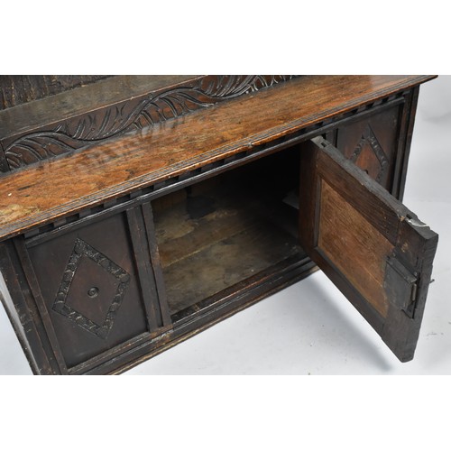 13 - An 18th Century Carved Oak Cabinet with Open Store to Cupboard Base, 75x25x71cm High