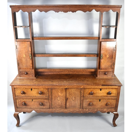 230 - A George III Oak Crossbanded Dresser Having Open Plate Rack with Three Central Shelves Flanked by Tw... 