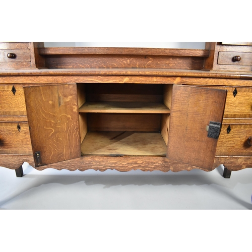 230 - A George III Oak Crossbanded Dresser Having Open Plate Rack with Three Central Shelves Flanked by Tw... 