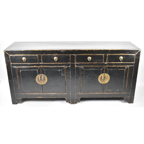 172 - A Chinese Qing Dynasty Type Black Lacquered Sideboard with Four Short Drawers Surmounting Two Cupboa... 