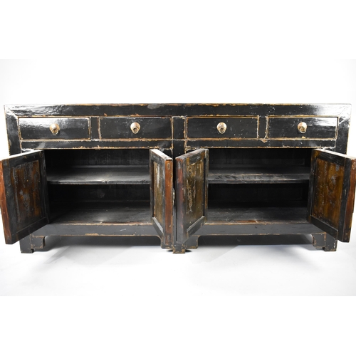 172 - A Chinese Qing Dynasty Type Black Lacquered Sideboard with Four Short Drawers Surmounting Two Cupboa... 