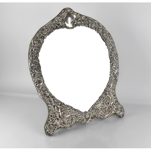 145 - A Large Late Victorian Silver Mounted Easel Back Heart Shaped Mirror, Repousse and Pierced with Deco... 