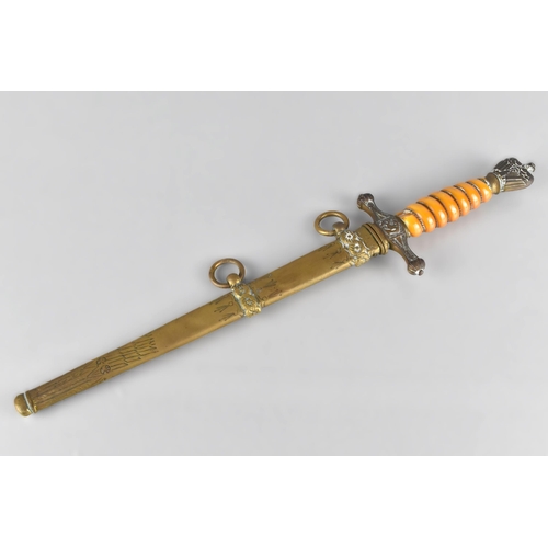 105 - A WWII German Kriegsmarine Officers Dress Dagger by Adolf Braun, with Polished Brass Eagle Pommel Fi... 