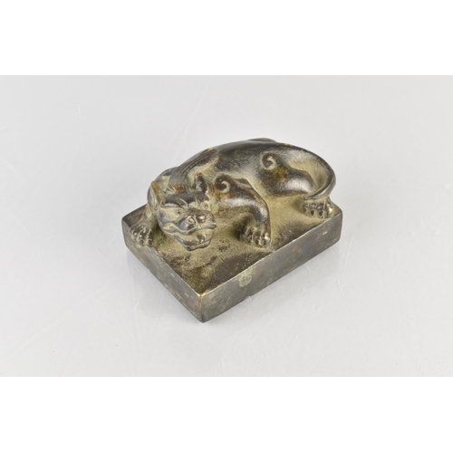 177 - An Archaic Chinese Bronze Seal Modelled as a Crouching Mythical Lion, 10x7x6cm high