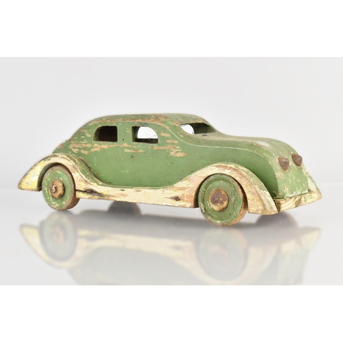 58 - An Early 20th Century Scratch-built Wooden Toy Car, Streamlined Shape with Original Polychrome Paint... 