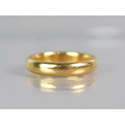 285 - A 22ct Gold Wedding Band, 7.2gms, Size K, Birmingham Hallmark and Makers Mark WHM in a Lozenge Carto... 