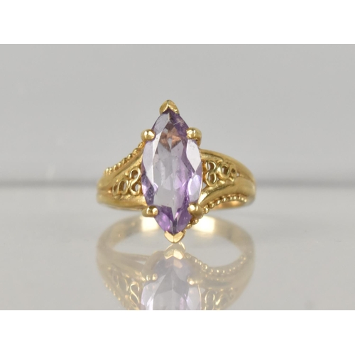 287 - A 9ct Gold and Amethyst Dress Ring, Marquise Cut Stone Measuring 14.7mm by 7.2mm, Retailed by Gems T... 