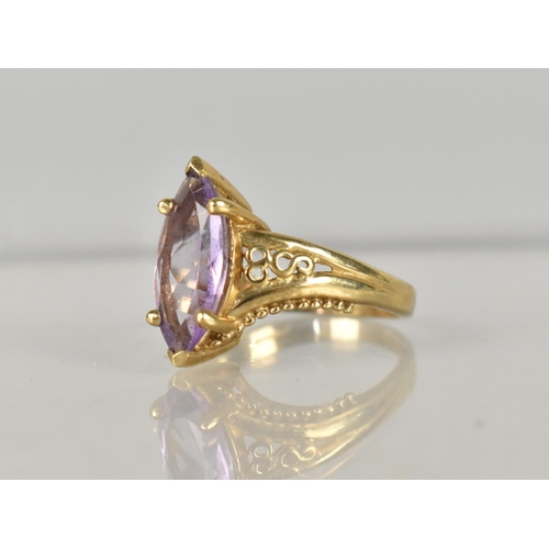 287 - A 9ct Gold and Amethyst Dress Ring, Marquise Cut Stone Measuring 14.7mm by 7.2mm, Retailed by Gems T... 