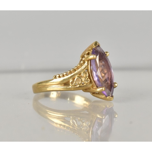 287 - A 9ct Gold and Amethyst Dress Ring, Marquise Cut Stone Measuring 14.7mm by 7.2mm, Retailed by Gems T... 