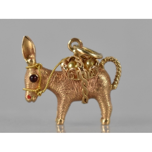 249 - A French 18ct Gold Pendant in the Form of a Laden Donkey, Baskets Containing Two Simulated Pearls, C... 