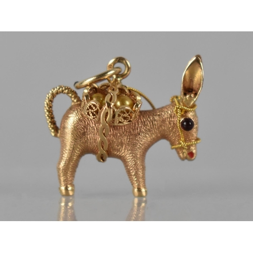 249 - A French 18ct Gold Pendant in the Form of a Laden Donkey, Baskets Containing Two Simulated Pearls, C... 