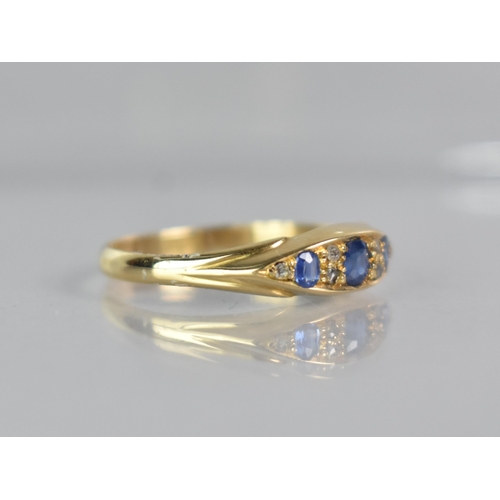 253 - A Victorian 18ct Gold, Sapphire and Diamond Boat Ring, Central Mixed Oval Cut Sapphire Measuring 3.7... 