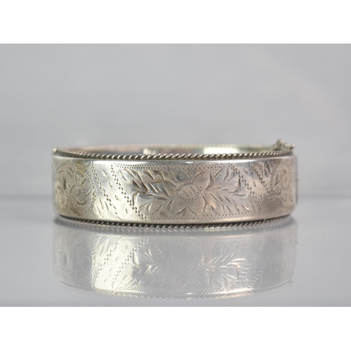 258 - A Vintage Silver Hinged Bangle having Engraved Floral Decoration with Rope Twist Edge, Stamped Inter... 