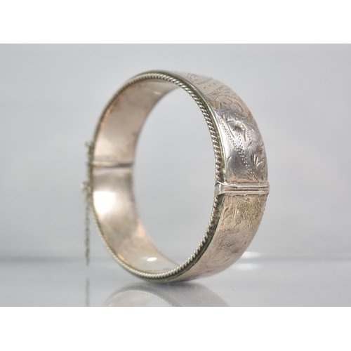 258 - A Vintage Silver Hinged Bangle having Engraved Floral Decoration with Rope Twist Edge, Stamped Inter... 