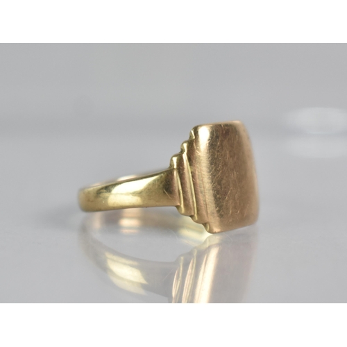 289 - A 9ct Gold Signet Ring, Square Head with Tiered Shoulders to a Plain Polished Band, Stamped to the I... 