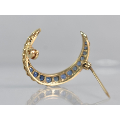 246 - A Sapphire and 9ct Gold Crescent Brooch Comprising Nineteen Graduated Mixed Round Cut Sapphires, Lar... 