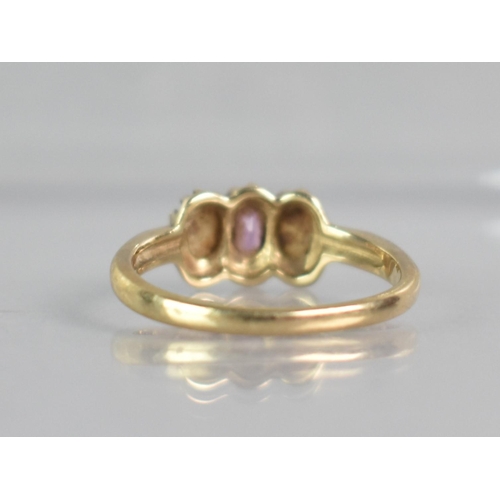 266 - An Opal and Amethyst Ladies Dress Ring, Central Mixed Oval Cut Amethyst Measuring 4.5mm by 2.7mm App... 