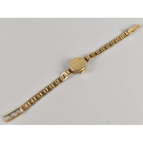 239 - A 9ct Gold Cased Accurist Ladies 21 Jewel Wristwatch, Champagne Dial with Baton Hour Indicators, Cas... 