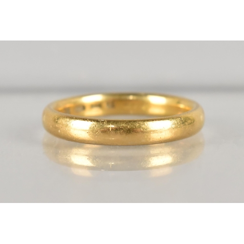 297 - An Early 20th Century 22ct Gold Polished Wedding Band of Court Shape, 4.8gms, Makers Mark WW Ltd Siz... 