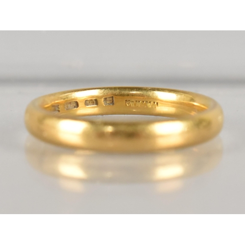 297 - An Early 20th Century 22ct Gold Polished Wedding Band of Court Shape, 4.8gms, Makers Mark WW Ltd Siz... 