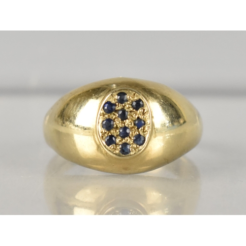 278 - A 9ct Gold and Sapphire Ladies Cocktail Ring, Oval Textured Head with Ten Round Cut Sapphire, Each A... 