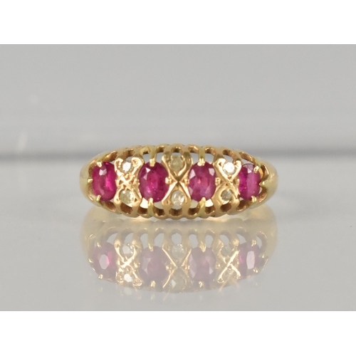 279 - An Edwardian 18ct Gold Ruby and Diamond Ring, Four Claw Set Oval Cut Rubies, Largest 3.7mm by 2.3mm,... 