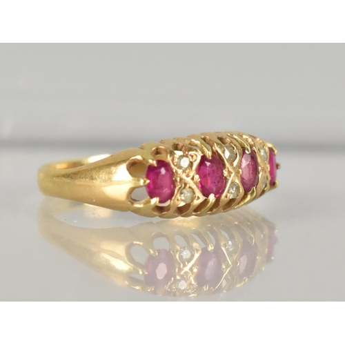 279 - An Edwardian 18ct Gold Ruby and Diamond Ring, Four Claw Set Oval Cut Rubies, Largest 3.7mm by 2.3mm,... 