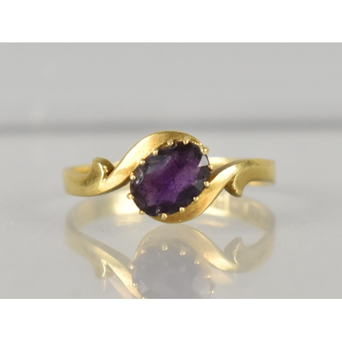 280 - An 18ct Gold and Amethyst Ladies Dress Ring, Oval Cut Stone Measuring 6.8mm by 5.0mm Supported in Th... 