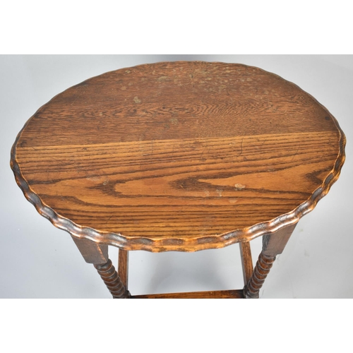 138 - A Mid 20th Century Oak Oval Topped Occasional Table with Barley Twist Supports, 59cms Wide