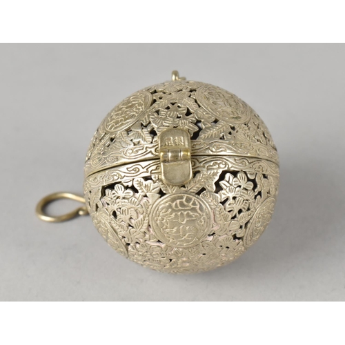 23 - A Chinese White Metal Gimballed Travelling Incense Burner of Globular Form, 5.5cms Diameter