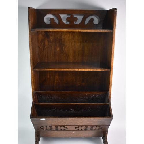 42 - An Edwardian Oak Combination Bookshelf and Magazine Rack with Raised Pierced Gallery, 46cms Wide and... 