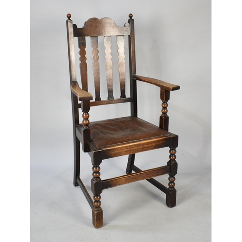 498 - An Edwardian Oak Side Armchair