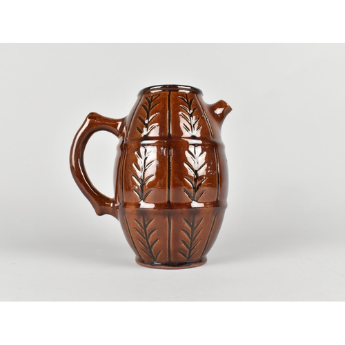 61 - A Stylised Treacle Glazed Terracotta Teapot, 19cms High