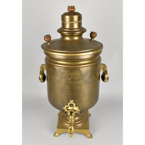 63 - A Mid 20th Century Russian Brass Two Handled Samovar with Tap, 55cms High