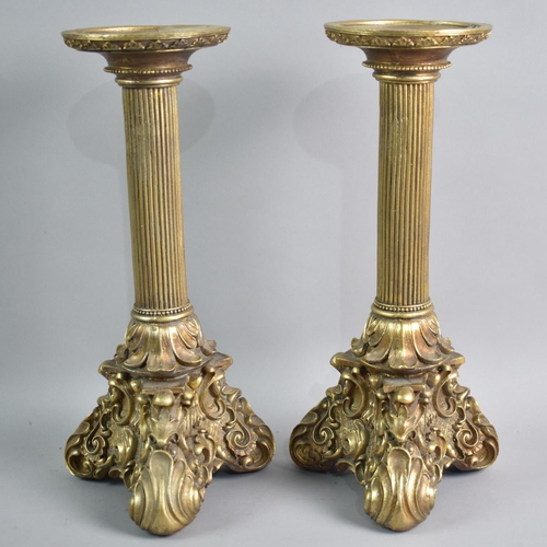 68 - A Pair of Modern Gilt Resin Candlesticks with Scrolled Tripod Base and Reeded Column Support, 28cms ... 