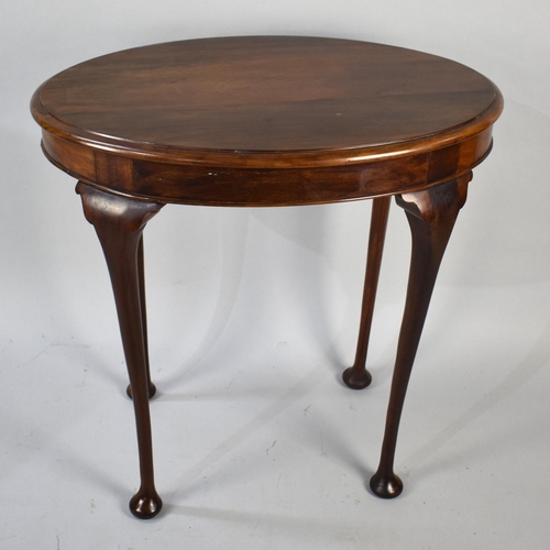 73 - An Edwardian Mahogany Oval Topped Occasional Table, 74cms Wide