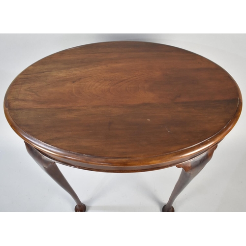 73 - An Edwardian Mahogany Oval Topped Occasional Table, 74cms Wide