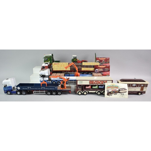 324 - A Collection of Nine Unboxed Corgi Diecast Lorries and Trailers with Loads