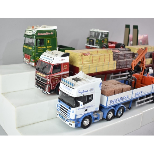 324 - A Collection of Nine Unboxed Corgi Diecast Lorries and Trailers with Loads