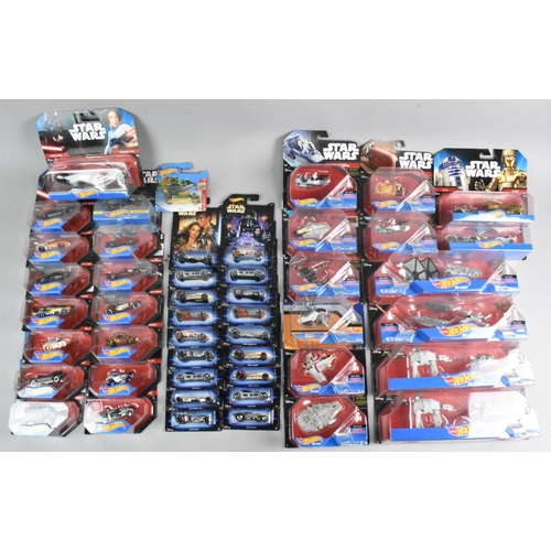 379 - A Collection of Forty Eight Star Wars Hot Wheels Vehicles and Sets in Unopened Blister Packs