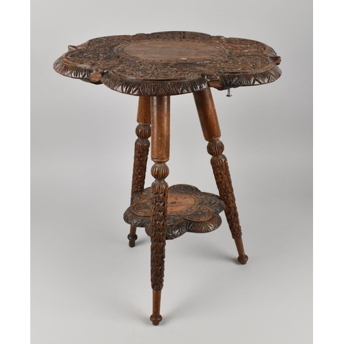 403 - An Intricately Carved Colonial Two Tier Occasional Table, Some Losses to Crocodile Heads 40cms Diame... 