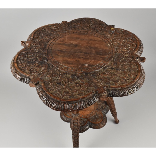 403 - An Intricately Carved Colonial Two Tier Occasional Table, Some Losses to Crocodile Heads 40cms Diame... 