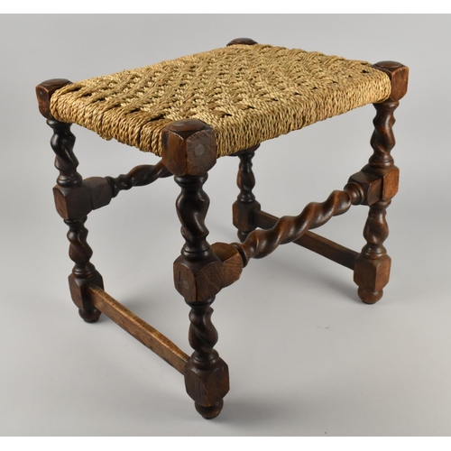 408 - An Oak Barley Twist Framed Stool with Woven Rush Seat, 38x30x38cms High