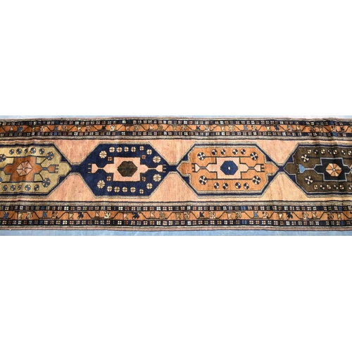 414 - An Anatolian Hand Made Runner, 462x69cms