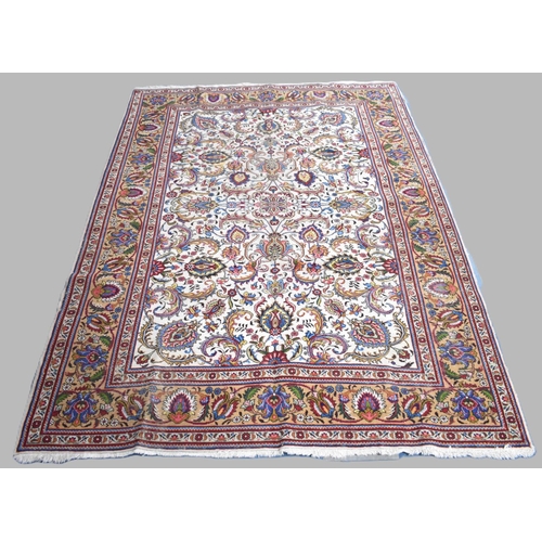 421 - A Persian Hand Made Tabriz Carpet, C1920, 301x212cms