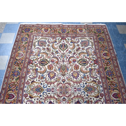 421 - A Persian Hand Made Tabriz Carpet, C1920, 301x212cms