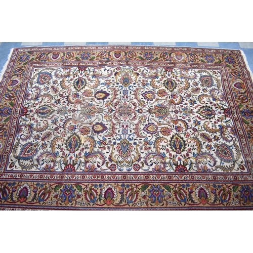 421 - A Persian Hand Made Tabriz Carpet, C1920, 301x212cms