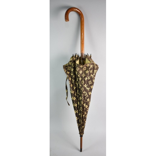 437 - An Early 20th Century Louis Vuitton Parasol, One Small Tear to Monogram Fabric